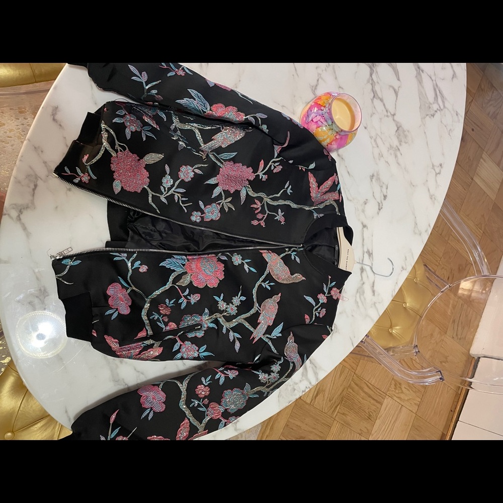 Embroidered misguided bomber